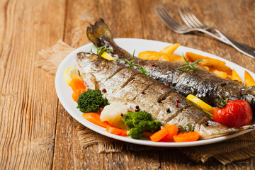 Grilled whole trout. Served with baked potatoes.