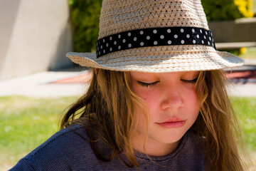 pretty little girl who endures the heat, the sun and the fatigue