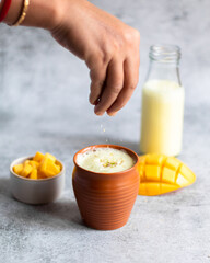 Mango Lassi - Yoghurt and mango based sweet beverage