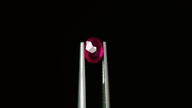 natural ruby gemstone on the turning table