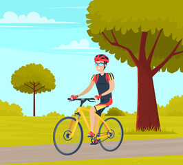 Guy in helmet and sportswear riding in forest. Man rides bicycle on sandy road. Male character doing sports outdoors. Sportsman cycling through trees. Person spends time on background of park