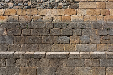 Architecture textures, granite and schist mix, medieval paired masonry wall