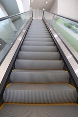 Electric drive It has automatic up-down movement, black handrails, made to provide comfort to humans. And travel faster Often seen in department stores or tall buildings. Take photo in Thailand.