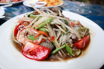 papaya salad, som tam or spicy shrimp and shell salad