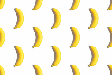 Fototapeta na wymiar Bananas on a white background. Seamless banana pattern. Seamless texture. Hard shadows.
