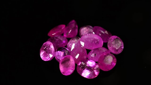 natural red rhodolite gemstone on the turning table