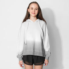 Girl in white and gray ombre hoodie winter fashion shoot © Rawpixel.com