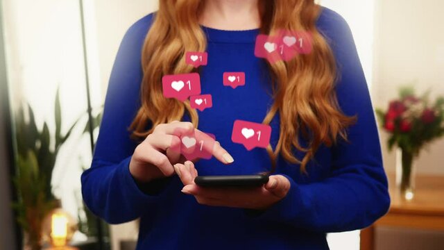 Young girl receive likes using phone social media network application. Animation like icons. Social, love, success, influencer concept animation on living room background
