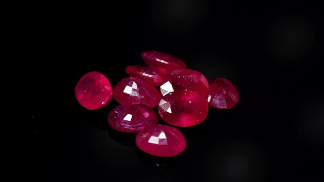natural red rhodolite gemstone on the turning table