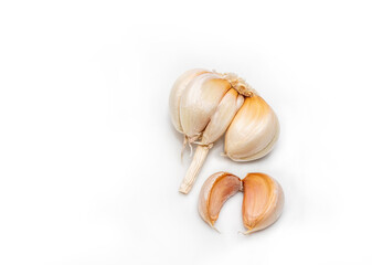 Raw garlic isolated on white background.