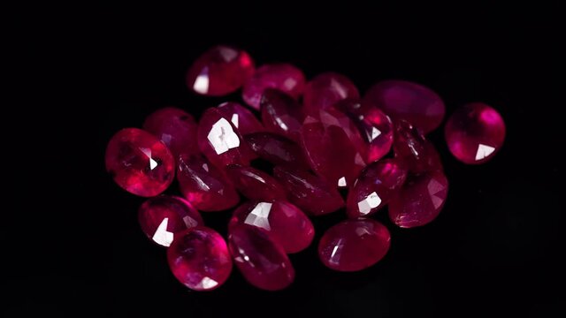 natural red rhodolite gemstone on the turning table