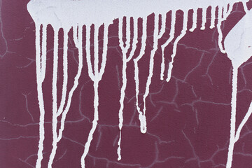 Smudges of white paint, drops. Wall color - Tawny Port, Hue Red. White cracks.