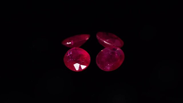natural red rhodolite gemstone on the turning table
