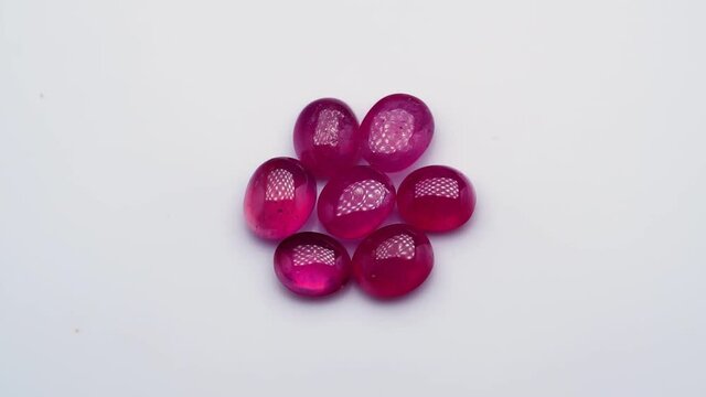 natural red rhodolite gemstone on the turning table