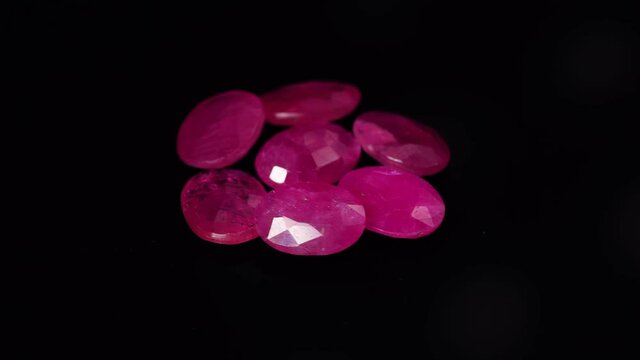 natural red rhodolite gemstone on the turning table