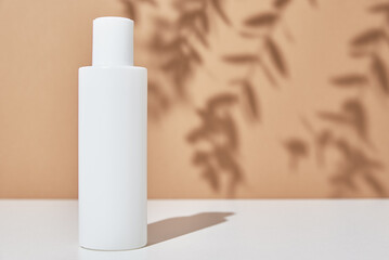 Cosmetics beauty mockup. White bottle on pastel background