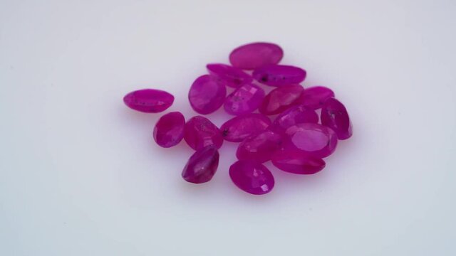 natural red rhodolite gemstone on the turning table