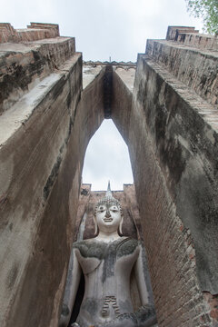 Seated Buddha image at Wat Si Chum temple in Sukhothai Historical Park