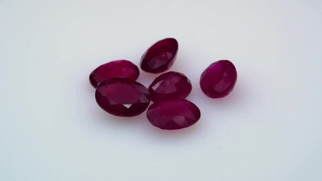 natural red rhodolite gemstone on the turning table