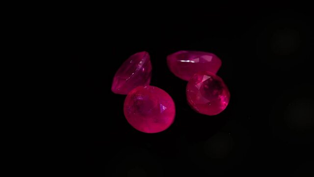 natural red rhodolite gemstone on the turning table