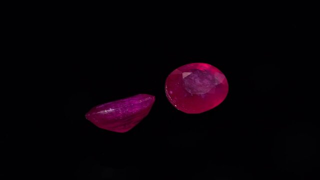 natural red rhodolite gemstone on the turning table