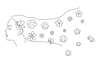 Beautiful woman with long hair and flowers