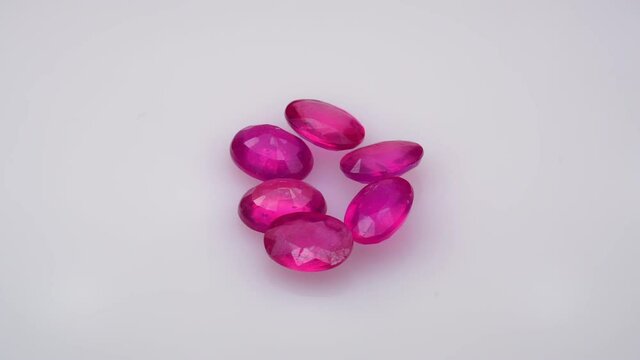 natural red rhodolite gemstone on the turning table