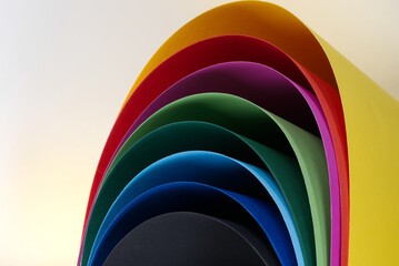 Fototapeta premium Colored thick paper bended into round shape. Photo taken April 26th, 2021, Zurich, Switzerland.