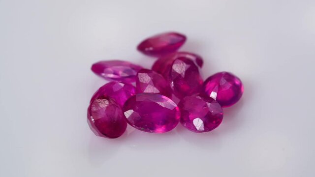 natural red rhodolite gemstone on the turning table