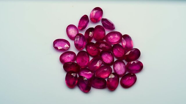 natural red rhodolite gemstone on the turning table