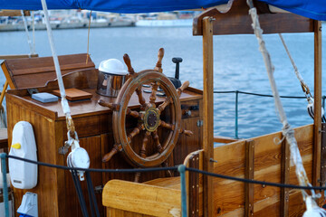 old ship wooden rudder traditional nautical steering wheel - obrazy, fototapety, plakaty