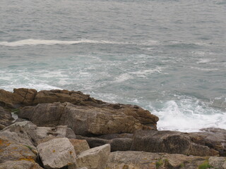 waves breaking on rocks