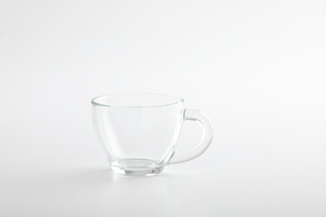 Empty tea cup on white background 