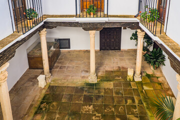 cute little patio in the Mondragon palace, a mudejar palace in the old town of Ronda, Andalusia (Spain)