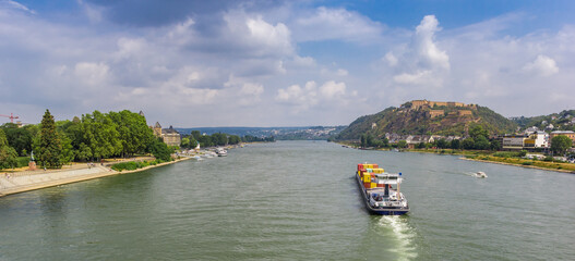 Panorama of a cargo ship on the river Rhine near Koblenz, Germany