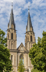 Fototapeta na wymiar Towers of the Stiftskirche church in Bonn, Germany