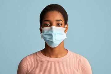 Coronavirus Prevention. Portrait Of Young African American Female Wearing Protective Medical Mask