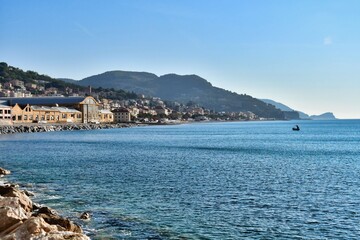 view of an island in mediterranean sea, photo as a background , in Finale Ligure sea village north...