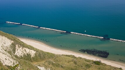 A series of breakwaters protects the coast in the Adriatic Sea (Pesaro, Marche, Italy) - 430126155