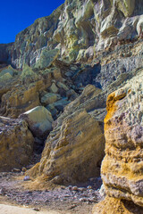 Sulfur volcano crater walls and the dangerous road, where many travelers hiked, climbing up to the...