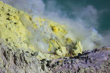 Gas coming out of the sulphur mines in the crater on the bottom of Mount Kawah Ijen active volcano, Banyuwangi, East Java, Indonesia. 