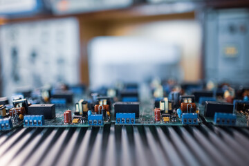Close-up electric green embedded microcircuits in production