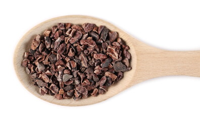 Chopped cocoa pieces pile in wooden spoon isolated on white background, top view