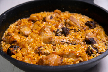 Montaña rice with wild rabbit, blood sausage, pork rib and chickpeas. Traditional spanish rice and tapa.