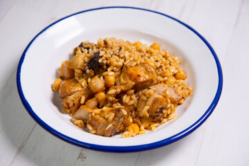 Montaña rice with wild rabbit, blood sausage, pork rib and chickpeas. Traditional spanish rice and tapa.