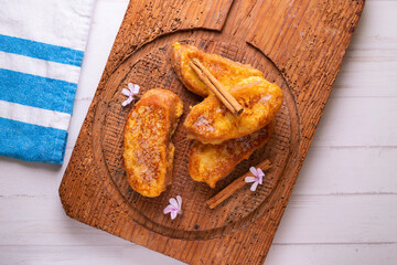 Torrijas, traditional spanish dessert. Deep fried slices of bread cooked with milk and sugar.