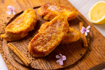 Torrijas, traditional spanish dessert. Deep fried slices of bread cooked with milk and sugar.