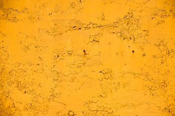 background metal surface with orange paint and rust