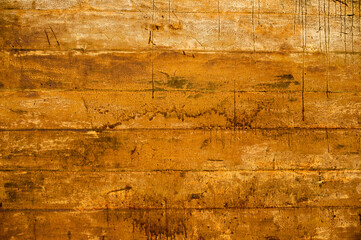 background metal surface with orange paint and smudges