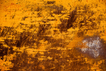 background metal surface with orange paint and rust